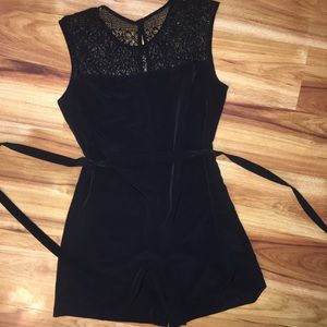 Black zip romper with waist tie